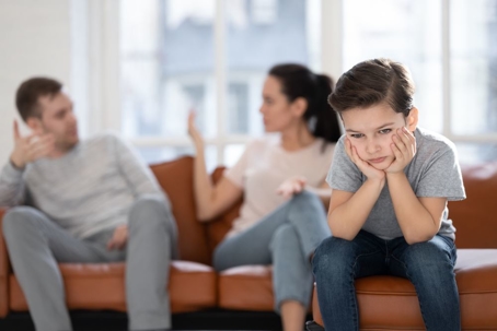 Child sad because of arguing parents