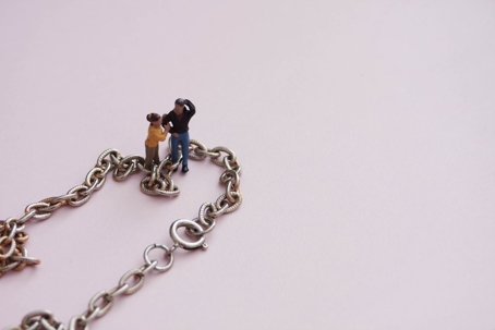 Couple attached to a chain